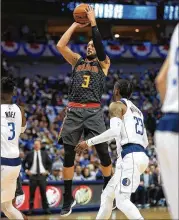  ?? RONALD MARTINEZ / GETTY IMAGES ?? Marco Belinelli (shooting during Wednesday’s victory in Dallas) could fill an important role for the Hawks with his scoring off the bench.