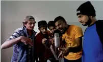  ?? Reuters ?? Lyari UnderGroun­d rappers, Danger, Abood, Killa, Slipknot Denna, and AnXiously perform in Karachi. —