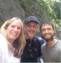  ?? (Courtesy) ?? ‘JUNGLE’ PRODUCER Dana Lustig (left) is seen here with director Greg McLean and actor Daniel Radcliffe on the set of the movie.