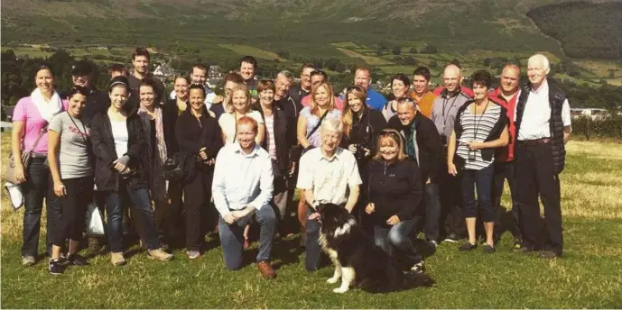  ??  ?? Aonghus Giggins,( kneeling front left) with the Cooley Mountains in the background..