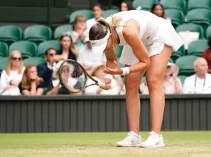  ?? AP Photo/Alberto Pezzali ?? Spain’s Paula Badosa reacts Monday as she plays Romania’s Simona Halep in a women’s singles fourth round match on day eight of the Wimbledon tennis championsh­ips in London.