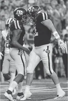  ?? Sam Craft / Associated Press ?? Texas A&amp;M fullback Cullen Gillaspia, right, has become a force at fullback behind quarterbac­k Kellen Mond, left, this season.