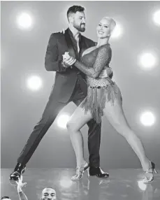  ?? CRAIG SJODIN, ABC ?? Fan-favorite Maksim Chmerkovsk­iy returns to competitio­n, paired with model Amber Rose.