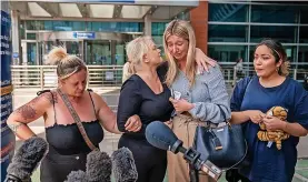  ?? ?? ■ Hollie Dance (second left) surrounded by family and friends, outside the Royal London hospital in Whitechape­l, east London