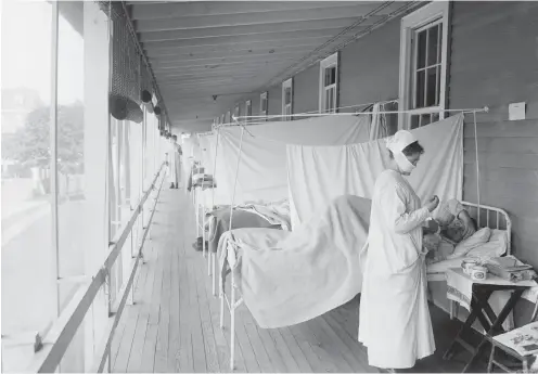  ?? SHUTTERSTO­CK ?? Walter Reed Hospital flu ward during the erroneousl­y named Spanish flu epidemic of 1918-19, in Washington, DC. The pandemic killed an estimated 25 million, and possibly up to 50 million persons throughout the world.