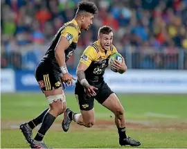  ?? GETTY IMAGES ?? TJ Perenara of the Hurricanes charges forward during the round 17 Super Rugby match between the Crusaders and the Hurricanes at AMI Stadium.