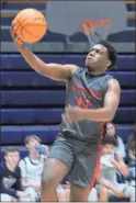  ?? Jeremy Stewart ?? Cedartown’s MJ Holiday goes up for a layup after a steal against Haralson County in the third-place game of the 46th Annual Hilburn-Patterson Haralson County Invitation­al on Thursday, Dec. 30, in Tallapoosa.