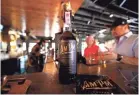  ?? COMMERCIAL APPEAL JOE RONDONE/THE ?? Jeff Johnson has partnered with Big River Distillery on a coffee-infused bourbon called AM-PM.