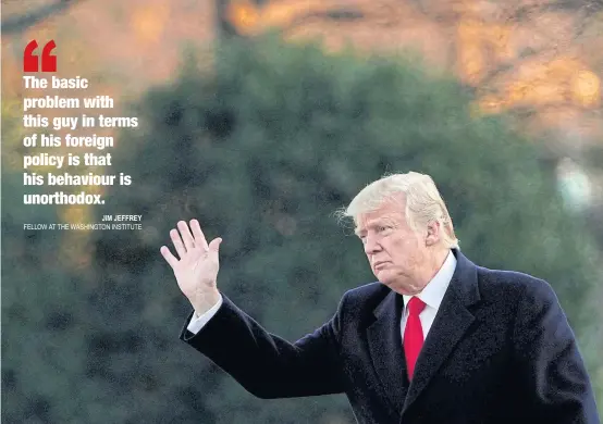  ??  ?? US President Donald Trump waves as he walks on South Lawn of the White House upon his return to Washington from Pittsburgh on Thursday.
