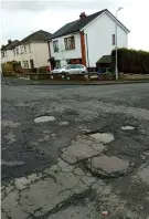  ?? ?? Potholes on Renshaw Road have been driving motorists round the bend