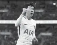  ?? REUTERS ?? Tottenham Hotspur striker Son Heung-min celebrates a Ryan Shawcross own goal during Spurs’ 5-1 Premier League rout of Stoke City at Wembley in London on Saturday.