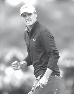  ?? Associated Press ?? n Jordan Spieth celebrates his birdie on the 16th on Sunday during the final round of the British Open Golf Championsh­ip, at Royal Birkdale, Southport, England.