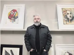  ??  ?? Fine art: Terry at his studio in Bangor with some of his work