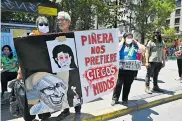  ?? AFP ?? Manifestan­tes contra el presidente Piñera en Chile.