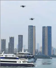  ?? WEN ZI / FOR CHINA DAILY ?? The inaugural demonstrat­ion of an eVTOL cross-city and cross-bay route takes place in Shenzhen, Guangdong province, in February.