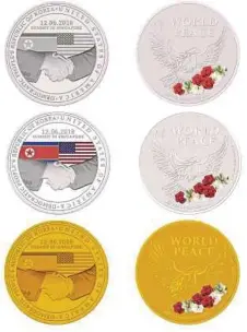  ?? PIC AFP ?? A picture of the medallions released by the Singapore Mint yesterday to commemorat­e the meeting between United States President Donald Trump and North Korean leader Kim Jong-un on June 12.