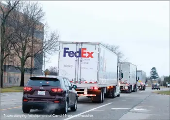  ?? Trucks carrying first shipment of Covid-19 vaccinevac­cine ??