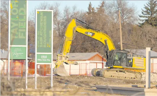  ?? PHOTOS: MICHAEL BELL ?? Signs outside the former Taylor Field recall the Roughrider­s’ glory days but the venerable stadium has all but disappeare­d.