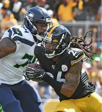  ?? Peter Diana/Post-Gazette ?? Mark Barron recovers a fumble against the Seahawks Sunday at Heinz Field. Of the season getting away from the Steelers, he said, “I don’t think that’s going to happen.”