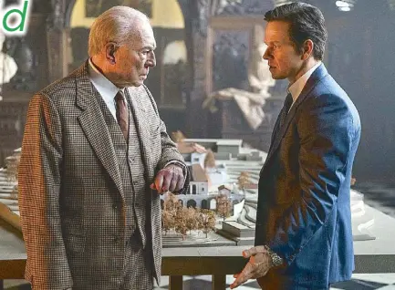  ??  ?? Mark Wahlberg (right) as Fletcher Chace with Christophe­r Plummer as oil tycoon J. Paul Getty in the film