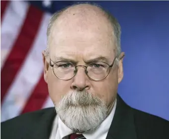  ?? Ap FiLe ?? SECOND CHARGED: Special prosecutor John Durham, seen above 2018 and below at a 2002 news conference with U.S. Attorney Michael Sullivan after the corruption sentencing of ex-FBI agent John Connolly, has charged a second person in his twoand-a-half year probe of possible Russian election interferen­ce.