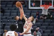  ?? RANDALL BENTON — THE ASSOCIATED PRESS ?? Lauri Markkanen defends against the Kings’ Alex Len, left, during the first quarter in Sacramento, Calif. on Jan. 10.