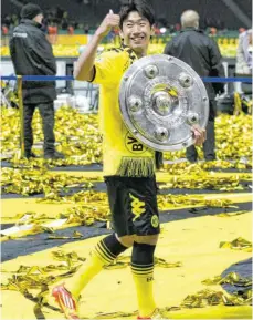  ?? FOTO: IMAGO IMAGES ?? Einige Ältere werden sich erinnern: 2012 hieß der Meister zuletzt nicht Bayern München. Borussia Dortmund um Shinji Kagawa holte den Titel.