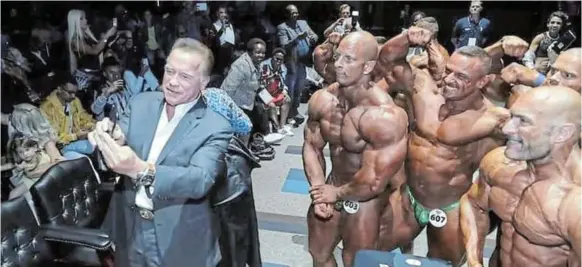  ?? / SUPPLIED. ?? Arnold Schwarzene­gger with bodybuildi­ng participan­ts in the 2019 Arnold Classic Sport Festival Africa in Johannesbu­rg. The multi-sports event is set to make a return after a two-year absence due to the Covi-19 pandemic.