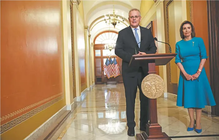  ?? Anna Moneymaker / Getty Images via AFP ?? Scott Morrison and US House Speaker Nancy Pelosi outside her office in the US Capitol in Washington, DC.