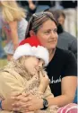  ?? Picture: FREDLIN ADRIAAN ?? CHRISTMAS SPIRIT: Bianca and Grace Potgieter, 9, enjoyed Christmas carols at Love Story’s Carols by Candleligh­t event in Richmond Hill last week