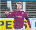  ??  ?? Thomas O’brien celebrates his equaliser for Arbroath at Palmerston