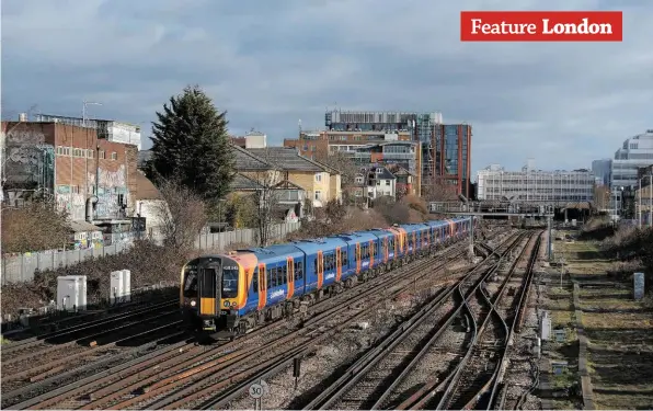  ?? ALEX DASI SUTTON. ?? South Western Railway 450545 leads the 1000 departure to Portsmouth Harbour away from Wimbledon on February 2 2019. Safeguardi­ng work continues to protect the proposed route of Crossrail 2 which includes new stations at both Wimbledon and Clapham Junction.