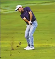  ?? MATT YORK AP ?? Second-round leader Russell Henley hits from the 10th fairway during the Sony Open on Friday.