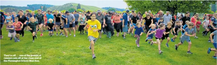  ??  ?? They’re off . . . one of the groups of runners sets off at the clean end of the Flemington School Mud Run.