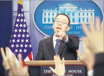  ?? Mark Wilson Getty Images ?? WHITE HOUSE budget director Mick Mulvaney addresses reporters Friday, when he predicted negotiatio­ns would continue Saturday and said any disruption­s from a weekend government shutdown would be minimal.