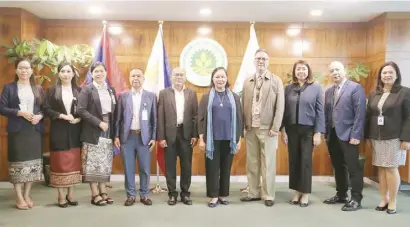  ?? PHOTOGRAPH COURTESY OF LANDBANK OF THE PHILIPPINE­S ?? Lao central bankers visit Delegates from the Bank of the Lao, the central bank of Laos, recently visited the Land Bank of the Philippine­s to learn more about the state-run bank’s model for developmen­t financing. LandBank president and CEO Cecilia Borromeo (6th from left) and other bank officers welcome Deputy Director General of the Finance Institutio­n Supervisio­n Department Phanthabou­n Sayaphet (fifth from left) and the rest of the delegates from the BOL.