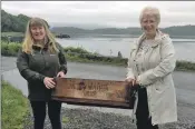  ??  ?? Janie and Kathlene with their dad’s lobster box.