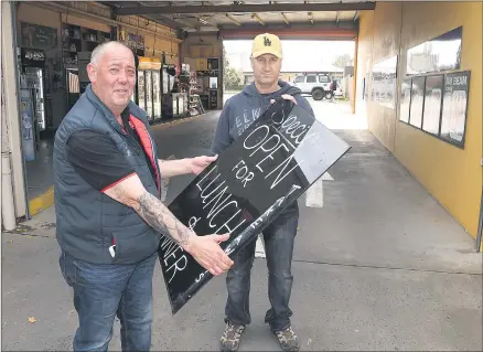  ??  ?? SOLDIERING ON: Horsham’s Victoria Hotel publican Mark Fitterer, left, and freehold owner John Brennan have vowed to get the hotel up and running again after fire significan­tly damaged the popular venue. They will set up a ‘mobile kitchen’ to offer takeaway meals from the car park.