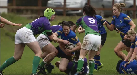  ??  ?? Player of the match Ellen Fox is taken down in the game against Mullingar. Photo: Noel McMullen