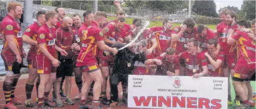  ??  ?? ● The champagne corks are popping after Caernarfon win the North Wales Plate. Picture: STEVE LEWIS