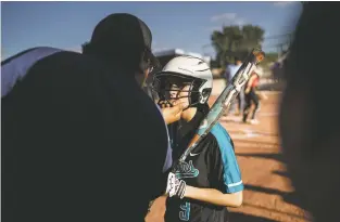  ?? CRAIG FRITZ/FOR THE NEW MEXICAN ?? Capital High School’s Silvia Pincherra gets advice from coach Leroy Cardenas during Wednesday’s game against Albuquerqu­e Academy.