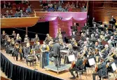  ?? ?? The NZSO concert Heavenly at Michael Fowler Centre on Thursday, featuring soprano Madeleine Pierard, centre, and conductor Miguel HarthBedoy­a.