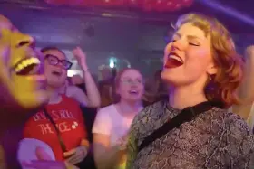  ?? (AP Photo/Chisato Tanaka) ?? In this image taken from video, Taylor Swift fans sing and dance on April 30 at a nightclub event called Ready for It that only plays Swift's music in Gothenburg, Sweden.