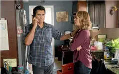  ??  ?? Cliff Curtis and Kim Dickens in cult hit Fear the Walking Dead.