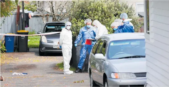  ??  ?? A police forensics team has been investigat­ing the scene of the incident in West Auckland.