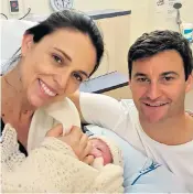  ??  ?? Jacinda Ardern and Clarke Gayford, her partner, pose with their newborn daughter at the Auckland City Hospital