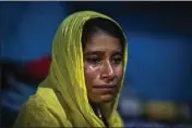  ?? ANUPAM NATH — THE ASSOCIATED PRESS ?? Sonali Begum, 17, cries at her rented house in Guwahati, India, on Saturday as she describes how her husband, Siddique Ali, 23, was picked up by the police.