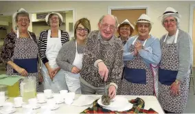  ??  ?? Burns Supper The lunch club’s vice chair Ken MacIntosh addresses‘The Haggis’