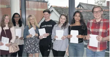  ??  ?? St Johns College sixth-formers collecting their A-level results last week