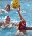  ??  ?? Strathmore High School’s Cotter Ashcraft takes a shot as Tulare Western High School defenders smother him Wednesday, during the second half of a game against Tulare Western High School in the CIF Central Section Division III Boys Water Polo first round at Strathmore.